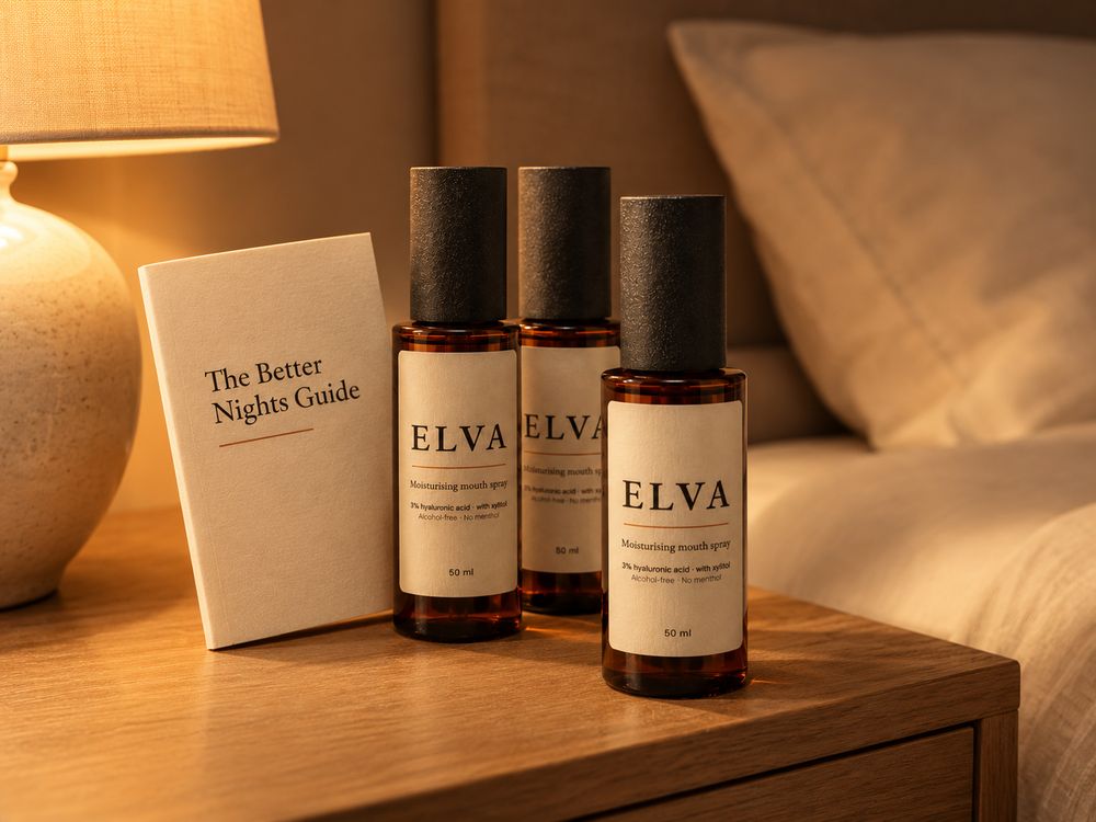 The Founding Night Kit: three bottles of ELVA and The Better Nights Guide on a bedside table